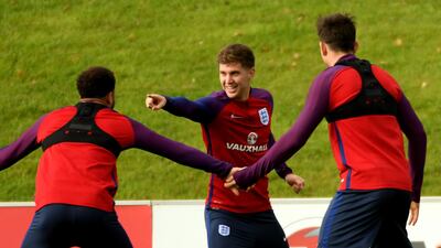 John Stones of England in action during a training session at St Georges Park. Ross Kinnaird / Getty Images