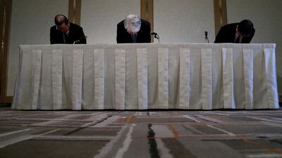 Kobe Steel chief executive Hiroya Kawasaki (C) and other company officials bow in apology during a news conference in Tokyo, Japan, after admitting the firm falsified data. Kim Kyung-Hoon/Reuters