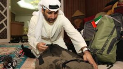 Sheikh Abdulaziz bin Ali bin Rashed Al Nuaimi prepares for his trek.