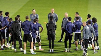 UAE manager Alberto Zaccheroni, centre right, talks to the players during their training session at New York University.