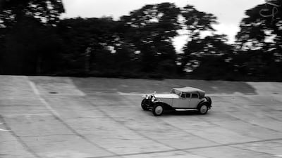 A Rolls-Royce on the race track at Brooklands, Surrey, in 1929.