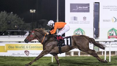 Connor Beasley leads Treasured Times to victory in Abu Dhabi on Sunday. Reem Mohammed / The National