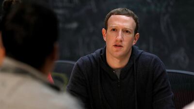 Cambridge Analytica scandal has pushed Facebook's value down as calls grow for chief executive Mark Zuckerberg to face mounting criticism. Jeff Roberson/AP