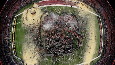 The Ohio State Buckeyes celebrate after defeating the Oregon Ducks 42 to 20 in the College Football Playoff National Championship Game at AT& T Stadium in Arlington, Texas. Tom Pennington / Getty