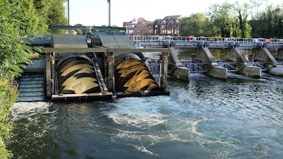 Two turbines at Romney Weir generate electricity by harnessing the power of moving water, providing renewable energy and meeting 40 per cent of Windsor Castle's electricity requirements. Photo: Alamy