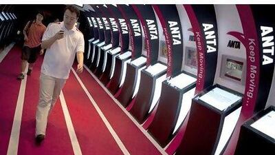 Chinese sportswear brands Anta and Li-Ning are trying to break into the global market and compete with more established brands such as adidas. Adam Dean / Bloomberg News