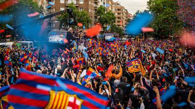 Barcelona fans welcome the team home after La Liga title was clinched. Getty Images