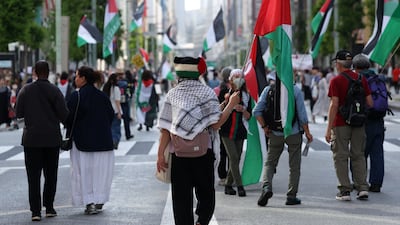 Pro-Palestinian activists protest through the streets of Ginza. Tokyo, Japan. Chris Whiteoak / The National