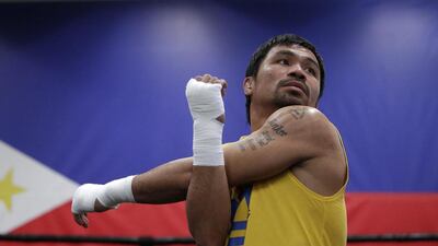 Subscribers with du will be able to watch Manny Pacquiao take on Floyd Mayweather for no charge. Jae C. Hong / AP Photo