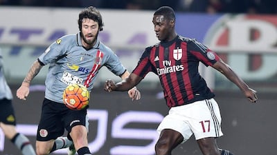 Alessandria’s Simone Branca and AC Milan’s Cristian Zapata vie for the ball during the Coppa Italia on Tuesday night. Alessandro Di Marco / EPA