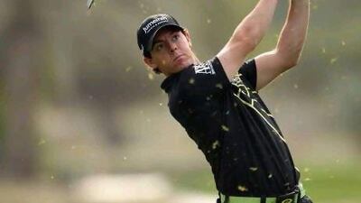DUBAI, UNITED ARAB EMIRATES - FEBRUARY 10: Rory McIlroy of Northern Ireland plays his second shot on the 16th hole during the second round of the Omega Dubai Desert Classic at the Emirates Golf Club on February 10, 2012 in Dubai, United Arab Emirates. (Photo by Andrew Redington/Getty Images) *** Local Caption *** 138637043.jpg