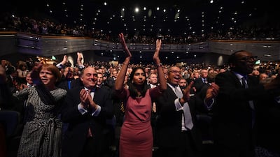 Ms Braverman applauds as Prime Minister Liz Truss delivers her keynote address on the final day of the Conservative Party Conference in Birmingham in 2022. AFP