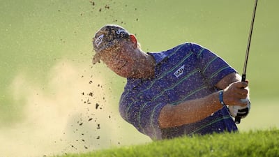 DUBAI, UNITED ARAB EMIRATES - JANUARY 30: Ernie Els of South Africa plays his third shot on the par four 6th hole during the second of round of the Dubai Desert Classic played on the Majlis Course on January 30, 2009 in Dubai,United Arab Emirates. (Photo by Ross Kinnaird/Getty Images) *** Local Caption *** GYI0056612095.jpg