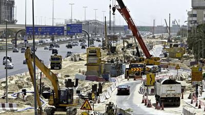 Work on the Business Bay canal project is carried out on Sheikh Zayed Road near Safa Park. A 1km traffic diversion will come into effect towards the end of October. Jaime Puebla / The National