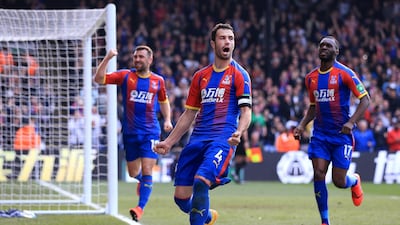 Luka Milivojevic of Crystal Palace celebrates with teammates after scoring his team's first goal. Getty Images