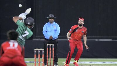 Sharjah's Rohan Mustafa bowls.