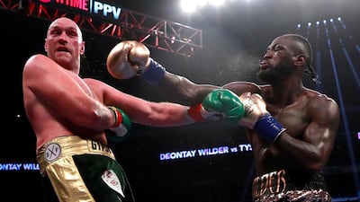 Tyson Fury, left, is eager to have a rematch with Deontay Wilder, but the question is when. Andrew Couldridge / Reuters