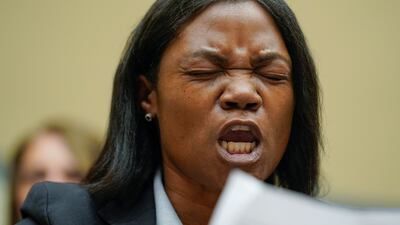 Lucretia Hughes, of DC Project - Women for Gun Rights, becomes emotional during the hearing. AP