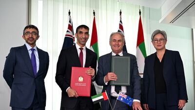 Sheikh Abdullah bin Zayed, Deputy Prime Minister and Minister of Foreign Affairs, Minister of State for Foreign Trade Dr Thani Al Zeyoudi, Australian Minister for Trade and Tourism Don Farrell and Australian Minister for Foreign Affairs Penny Wong during the signing of the agreement in Canberra. EPA