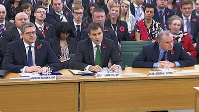 M15 chief Andrew Parker, John Sawers, the head of M16, and Iain Lobban GCHQ director Iain Lobban attend an Intelligence and Security Committee hearing in the British parliament. UK Parliament via Reuters