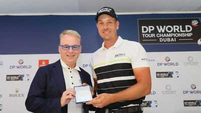 Henrik Stenson is presented with Honorary Life Membership by European Tour chief executive Keith Pelley. Andrew Redington / Getty Images