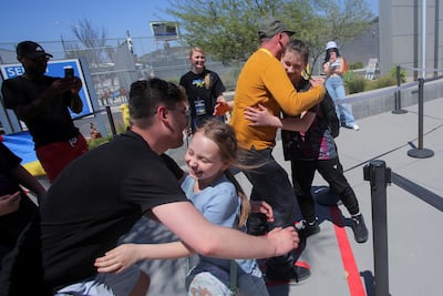 Ukrainians who fled to Mexico amid the Russian invasion of their homeland are welcomed to the US by volunteers in San Ysidro, California. Reuters