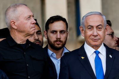 Israeli Prime Minister Benjamin Netanyahu, right, and Defence Minister Yoav Gallant attend a ceremony at an army base near Mitzpe Ramon, Israel, on Thursday. Reuters