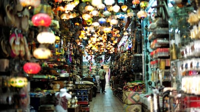 A visitor looks at traditional light-shop at the Bab Al Bahrain Souq in Manama, Bahrain. Reuters