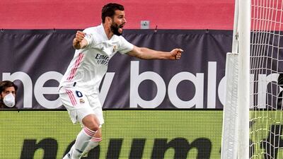 Real Madrid's Nacho Fernandez celebrates with teammates after scoring. EPA