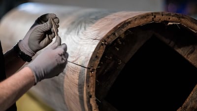 Over the decades, the room's oak panelling and rosewood veneer has shrunk and cracked and now requires expert repair and conservation. Christophe Morin for The National