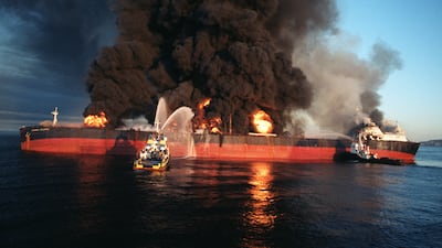 The Singapore-flagged Norman Atlantic ablaze in December 1987 after it was attacked by an Iranian warship in Omani territorial waters as it approached the Strait of Hormuz. AFP