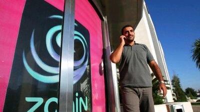 The Saudi affiliate of the Zain Group trimmed its losses to 484 million riyals in the three months ended September. Salah Malkawi for The National
