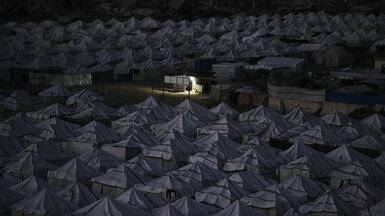 A tent camp for displaced Palestinians stretches across Gaza city. AP