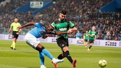 Napoli's Victor Osimhen (L) scores the 2-0 goal during the Italian Serie A soccer match US Sassuolo vs SSC Napoli at Mapei Stadium in Reggio Emilia, Italy, 17 February 2023. EPA / SERENA CAMPANINI