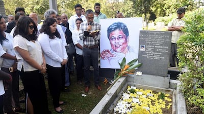 Sri Lankan mourners gather at the grave of editor Lasantha Wickrematunge on the 10th anniversary of his death in Colombo on Tuesday AFP