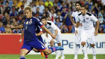 Japan's Keisuke Honda slots home a penalty during their Asian Cup Group D victory against Iraq at the Brisbane Stadium on January 16. Edgar Su / Reuters