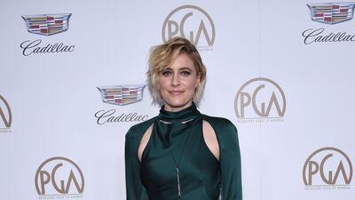 Director Greta Gerwig braved - and conquered - bias cut satin with this forest green Monse dress. Chris Delmas / AFP