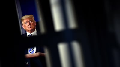 US President Donald Trump listens during the daily briefing on the coronavirus at the White House, in Washington, DC. AFP