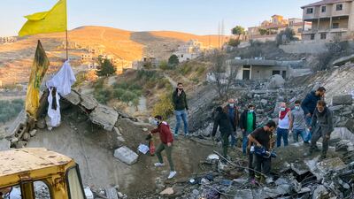 Rescuers search for survivors after an Israeli air strike in Shmestar, a village in the Bekaa Valley, in November. AFP