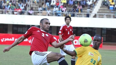 Egypt defender Ahmed Elmohamady, left. Tsvangirayi Mukwazhi / AP Photo