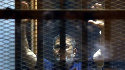 The Cairo Criminal Court sentenced former president Mohamed Morsi to life in prison over spying charges. Khaled Elfiqi / EPA / File June 2, 2015