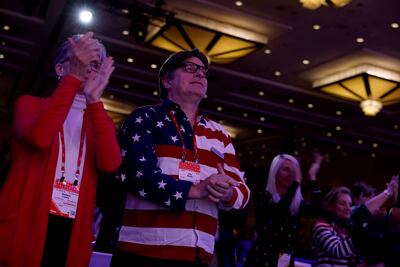 People applaud as Matt Gaetz speaks during the annual Conservative Political Action Conference. Getty / AFP