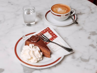 Sachertorte, a cake invented in Vienna in the 19th century, comes with chocolate sponge and apricot jam. Photo: Cafe Sacher / WienTourismus