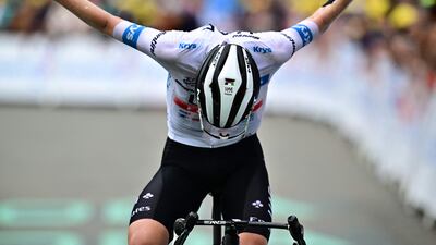 Tadej Pogacar crosses the finish line of stage six. AFP