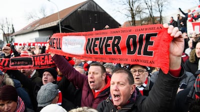 Supporters of Manchester United attend a memorial service commemorating the Munich air disaster of February 6, 1958, where 23 people including 8 members of the Manchester United football team lost their lives, on February 6, 2018 in Munich, Germany. Sebastian Widmann / Getty Images