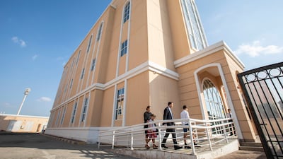 Worshippers arrive at the Church of Jesus Christ of Latter-Day Saints in Abu Dhabi on Sunday, December 11, 2022. Ruel Pableo for The National