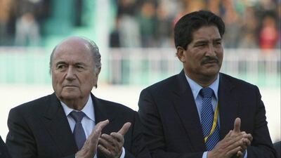 Former Fifa president Sepp Blatter, left, and All Nepal Football Association President Ganesh Thapa, right. Fifa's ethics committee on Monday, Nov. 16, 2015 announced that Thapa has been banned for 10 years from all football activities at both national and international level. (AP Photo/Binod Joshi, file)
