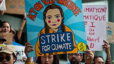 People protest in front of the Ministry of Natural Resources and Environment in Bangkok, Thailand. Getty Images