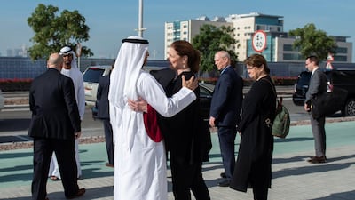 Susan Pompeo greets Yousef Al Otaiba at the NYU Abu Dhabi campus. Reuters