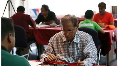 Mohammed Sulaiman competes on the final day of the Gulf Scrabble Championship.